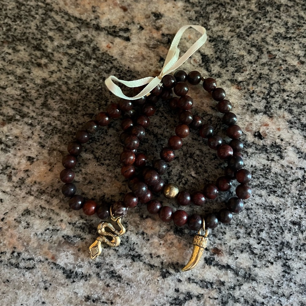 Brown beaded bracelets with detail on each one!!
